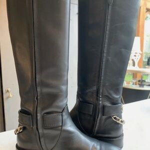 CHANEL Black Leather Over-the-Knee Boots with Gold Chain Accent